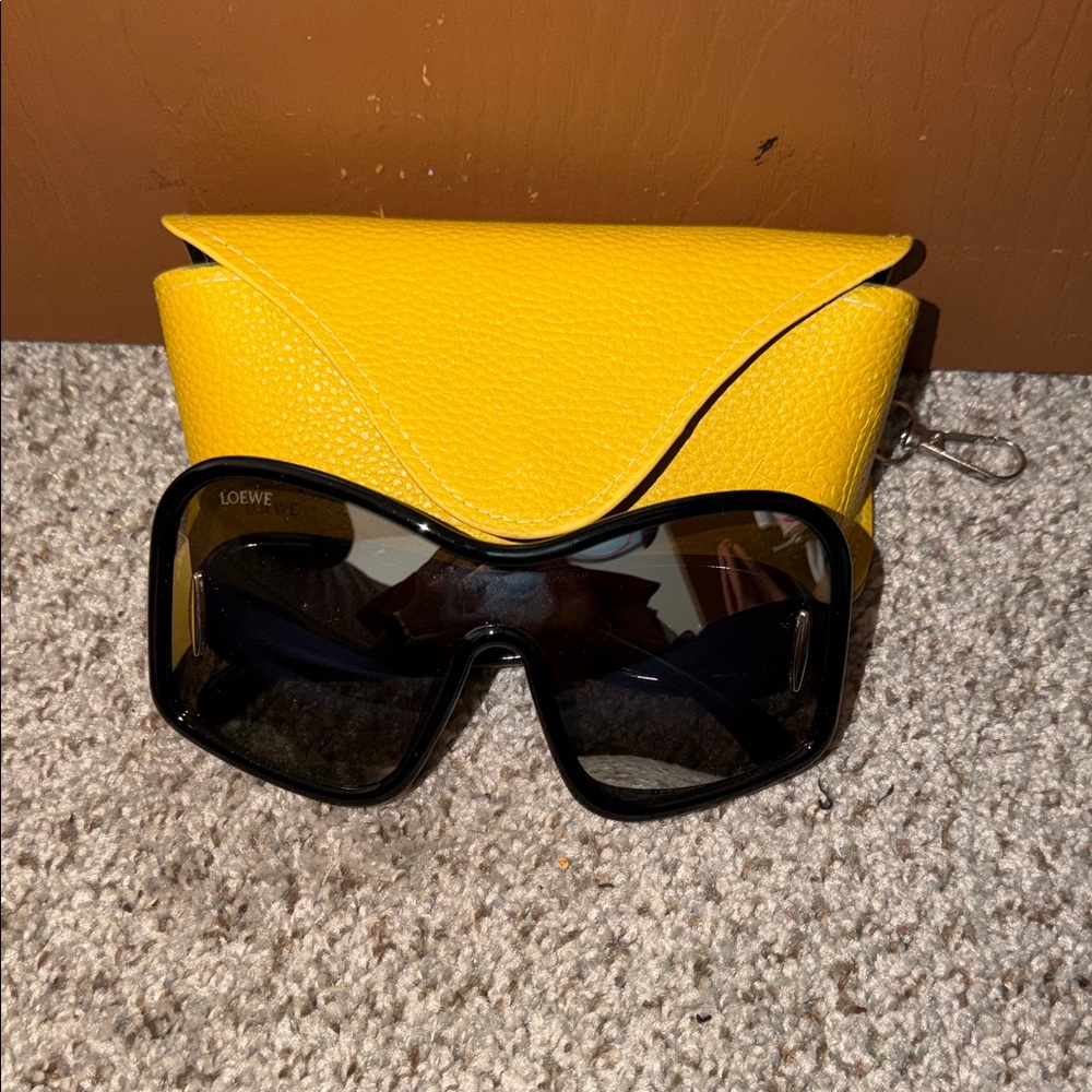 Loewe Sunglasses with Black Frame and Gold.